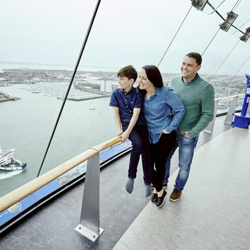 Family looking over Portsmouth Harbour from Spinnaker Tower