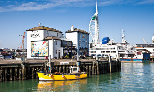 Fishing Boat Camber Dock in Old Portsmouth, with the Spinnaker Tower in the distance