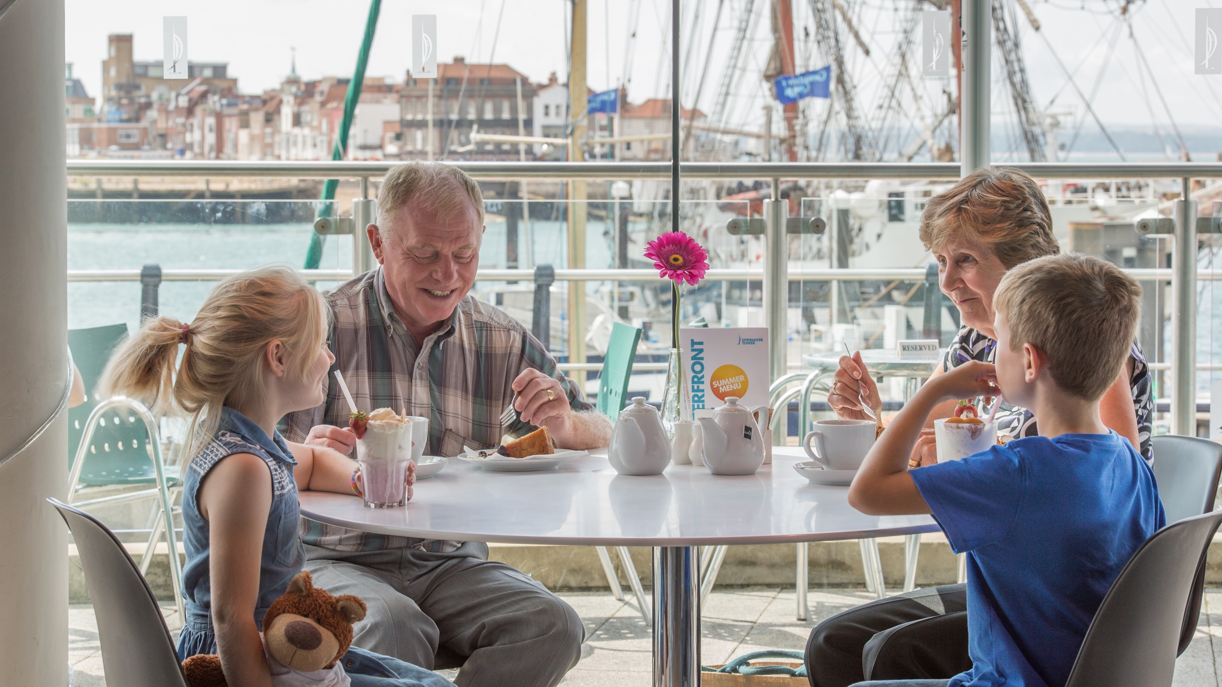 Family eating at Spinnaker Kitchen & Bar on the Portsmouth Harbour Waterfront