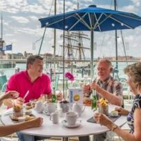 Family eating at Spinnaker Kitchen & Bar on the Portsmouth Harbour Waterfront