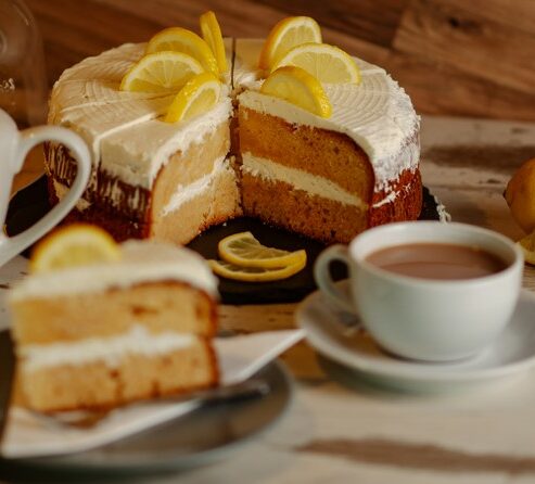 Slice of lemon cake and a cup of tea in the Spinnaker Kitchen and Bar